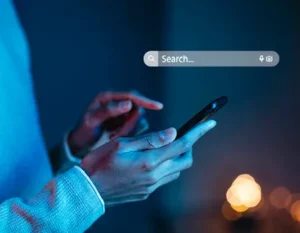 Man searching on his mobile phone